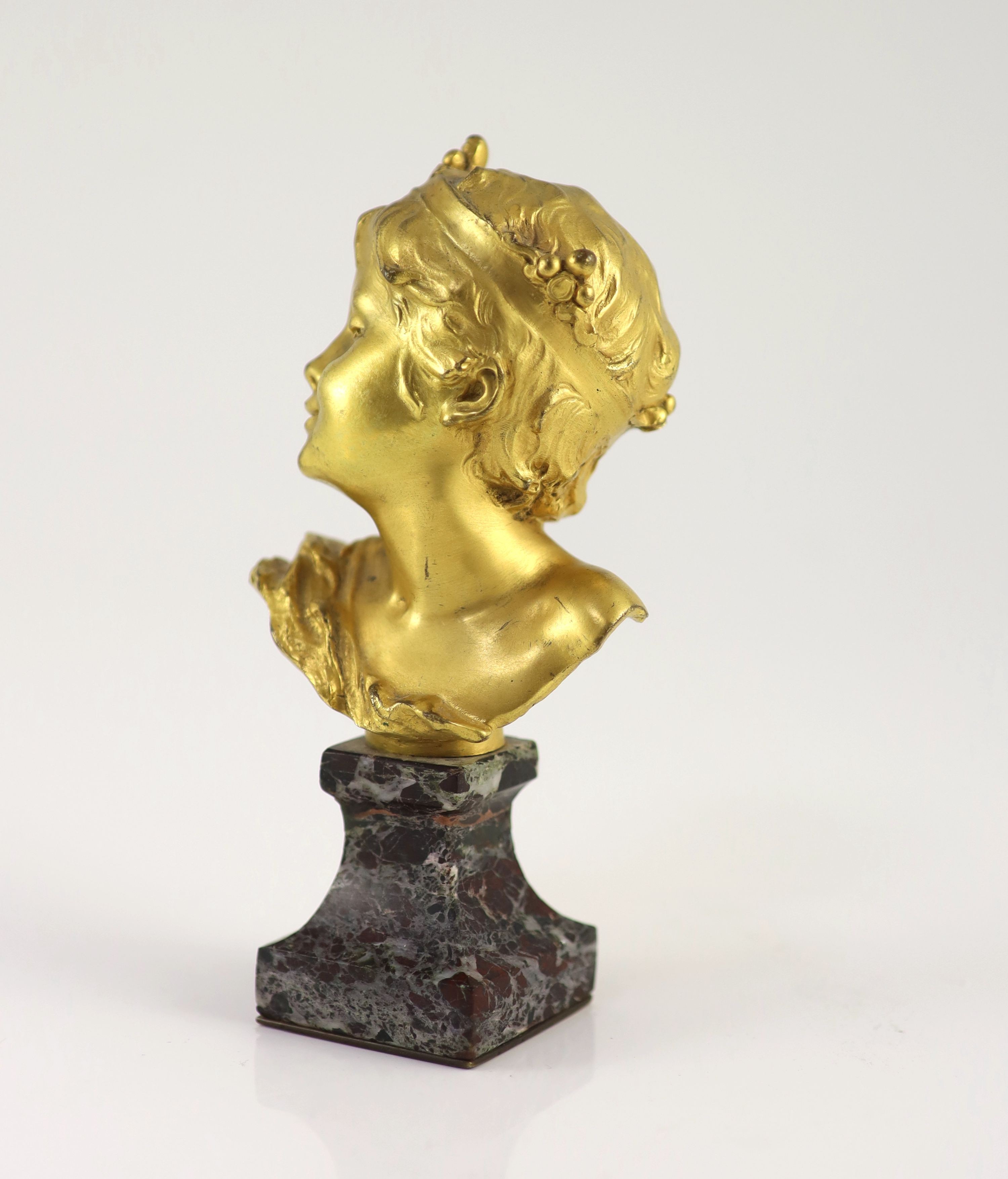 Raoul Francois Larche (1860 - 1912). An ormolu head of a boy king, 16.5cm high overall